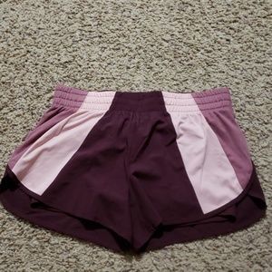 Maroon and pink athletic shorts